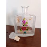 Bottiglia di vetro dipinta a mano a decoupage 