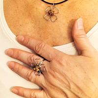 Set Parure Anello regolabile + collana fiore inox