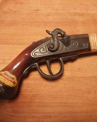 Bottiglia vintage vino Lacrima Chrysti pistola