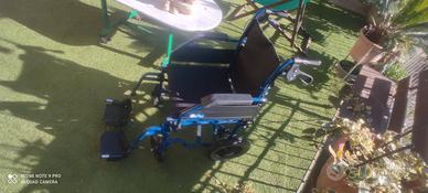 Sedia rotelle pieghevole 