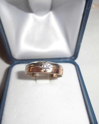 Anello in oro bianco e oro rosso con brillante