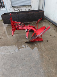 Aratro voltorecchio a scatto