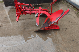 Aratro voltorecchio a scatto