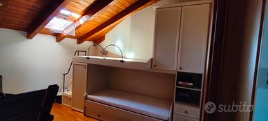 cameretta con 3 posti letto
