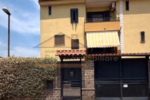 Villa a schiera+giardino+box