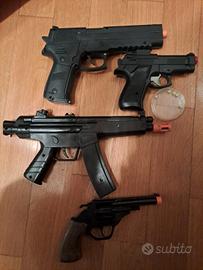 Pistole giocattolo e pistola pallini di plastica