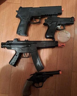 Pistole giocattolo e pistola pallini di plastica