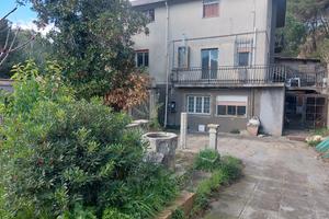 Appartamento, giardino e garage