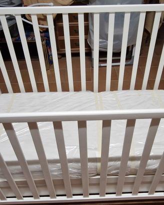 Culla in legno con ruote e anta scorrevole