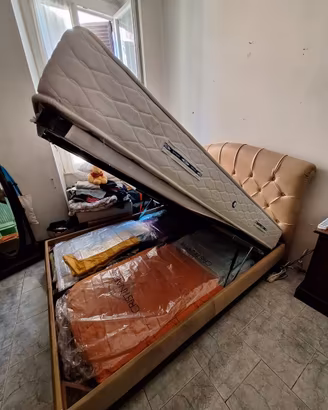 LETTO MAT. CONTENITORE TESTIERA PELLE + MATERASSO