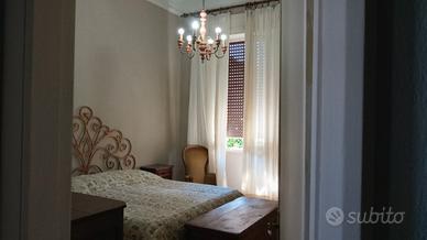 Camere arredate con terrazza