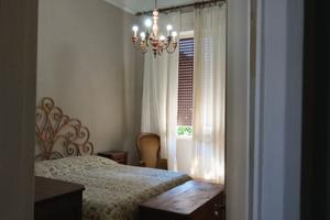 Camere arredate con terrazza