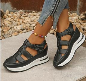 Scarpe nere zeppa 40/41. suoletta interna rialzata