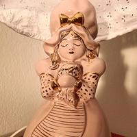 Bambola lampada in ceramica 