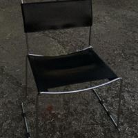 Sedia in pelle e acciaio