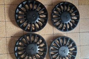 COPRI-CERCHI-BORCHIE DA15" COL-NERO ORIG LANCIA Y