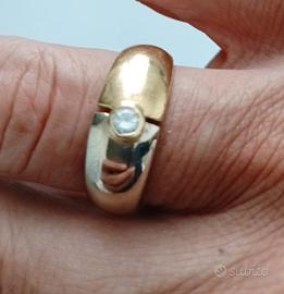 anello uomo in oro bianco e giallo.