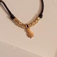 Dodo Gufo + 8 granelli tutto oro 18 kt 