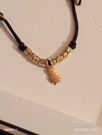 Dodo Gufo + 8 granelli tutto oro 18 kt 