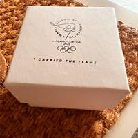 Spilla tedoforo milano cortina 2026