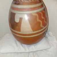 Un vaso 40 h. x 22 l. e 2 cestelli in metallo