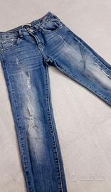 Jeans donna Skinny blu. taglia S con strappi.