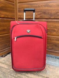 Valigia trolley media tessuto canvas.