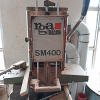 Macchina per legno. Cavatrice a catena