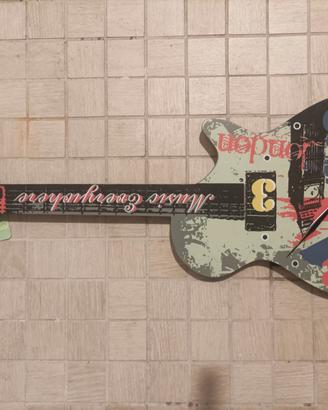 Orologio da parete a forma di chitarra