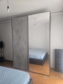 Armadio 2 ante scorrevoli (180 cm con specchio )