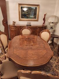 tavolo più sei sedie e credenza