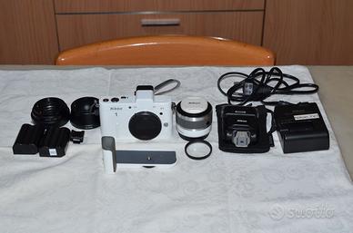 Nikon 1V1 corredo