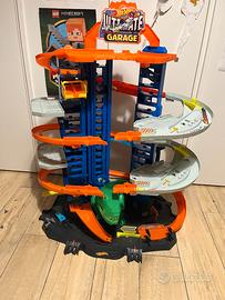 Pista Hot Wheels bimbo con dinosauro