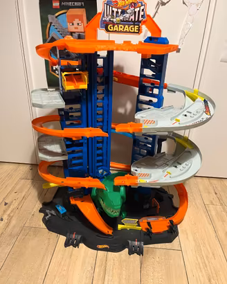 Pista Hot Wheels bimbo con dinosauro