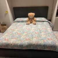 Armadio a ponte con letto mateimoniale