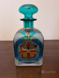 Bottiglia in vetro decorata a mano
