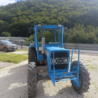 Landini 65000 con rimorchio e bardachino