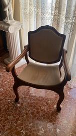 Poltrona vintage in legno intagliato e velluto