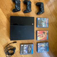 Playstation 4 comprensiva di 3 joystick e ;giochi,