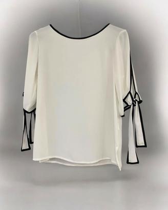 Blusa elegante Sohà bianca con dettagli neri