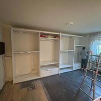 Armadio a muro 4 ante scorrevoli di circa 5 metri