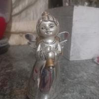 statuetta rivestita in argento