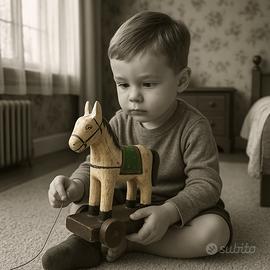 Cavallino vintage antico legno su rotelle epoca