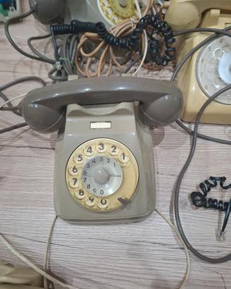 telefoni a disco grigi