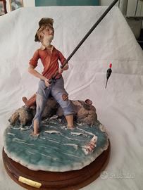 statuetta pescatore