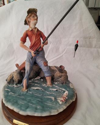 statuetta pescatore