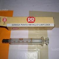 Vecchie siringhe in vetro 5 e 10 cc