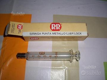 Vecchie siringhe in vetro 5 e 10 cc