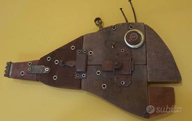 Pesci in legno con materiali riciclati