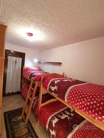 Trilocale ampio soggiorno posto auto sulle piste